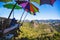 Tourists asian couple sitting eat noodle on the wooden platform and looking scenic view of beautiful nature mountains at Ban Jabo,