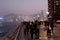 Tourists on the Avenue of Stars on waterfront of Victoria harbor