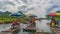 Tourists on bamboo rafts on Yulong River in Yangshuo