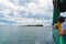 Tourists on barge at Fraser Island crossing point from Inskip Point Road to Fraser Island beach in Queensland, Australia