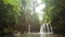 Tourists bathing in the Carachupa Pakcha waterfall near the village of El Coca