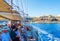 Tourists on boat after an exciting Santorini Caldera day trip Greece