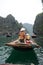 Tourists on boats in Halong Bay