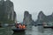 Tourists boats near the islands of ha long bay Vietnam