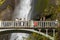 Tourists on the bridge over the Multnomah waterfall in ORegon