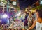 Tourists buy food Fishermans Village Night market Koh Samui Thailand