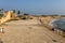 Tourists at Caesarea ancient port. The ancient Caesarea Maritima city and harbor was built by