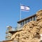 Tourists at Caesarea ancient port. The ancient Caesarea Maritima city and harbor was built by