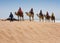 Tourists on camels - Morocco Essaouira Beach