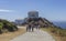 Tourists at the Cape Finisterre Lighthouse, a landmark and the final destination in the Camino de Fisterra, Galicia, Spain.