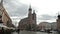 Tourists on central square of city before Mariatsky church