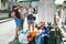 Tourists choose a good on flea market in Paimpol