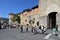 Tourists at the city wall of San Gimignano in Italy