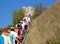 Tourists climb to the cave temple of the Assumption Monastery in the nature reserve Divnogo