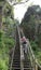 Tourists climb the wooden stair. Bornholm.Denmark