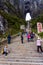 Tourists climbing 999 stairs to Haven Gate in Tianman Mountains