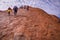 Tourists climbing Uluru Ayers Rock