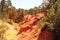 Tourists between colorful ochre rocks, Roussillon, France