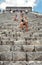 Tourists conquering Chichen Itza main pyramid.