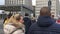 Tourists cross the street at traffic lights at Potsdamer Platz In Berlin