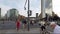 Tourists Cross The Street At Traffic Lights At Potsdamer Platz In Berlin