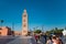 tourists crossing the road in front of Koutoubia mosque