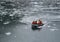 Tourists from the cruise ship in the Garibaldi fjord in the archipelago of Tierra del Fuego.