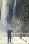 Tourists on the cruising boat approaching Stirling Falls , Milford Sound, Fiordland, South Island of New Zealand