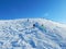 Tourists in Dombay - a downhill skiing resort in Karachayevo-Cherkesiya, Russia. At an altitude 3200 metres.