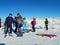 Tourists in Dombay - a downhill skiing resort in Karachayevo-Cherkesiya, Russia. At an altitude 3200 metres.