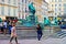 Tourists at Donner Fountain on Neuer Markt Square in Vienna