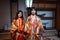 Tourists dressed into the Beautiful National Kimono in the Japanese Castle