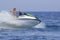 Tourists enjoy driving jetski