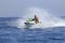 Tourists enjoy driving jetski