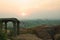 Tourists enjoy and photograph the sunset in Hampi