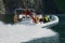 Tourists enjoy the safari tour by speed boat at the Aurlandsfjord in Flam, Norway.