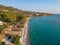 Tourists enjoy summer vacations swimming at Almyros beach in Kato verga seaside town near Kalamata, Greece