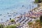 Tourists enjoy sun and watersports in the volcano lake of Castel Gandolfo