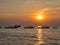 Tourists enjoy the sunset in boats on Tonle Sap Lake, near Siem Reap in Cambodia