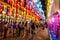 Tourists enjoy their time checking out the beautiful elaborate hanging lanterns at Tha Pae Gate are