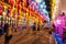 Tourists enjoy their time checking out the beautiful elaborate hanging lanterns at Tha Pae Gate are