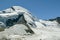 Tourists enjoying sunny day on Mittelallalin above the Saas-Fee in Switzerland