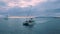 Tourists enjoying sunset cruise on modern catamaran yacht, People on Hawaii 4K