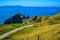 Tourists enjoying their time at Durdle Door in Dorset, England, UK