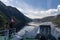 Tourists enjoying the view from ferry sailing at Lysefjorden in Norway in summer