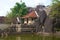 Tourists at the entrance to the ancient cave temple. The Buddhist temple complex of Isurumuniya