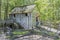 Tourists Examine the Water-Driven Cades Cove Cable Grist Mill