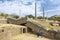 Tourists explore famous collapsed obelisks of Axum, Ethiopia.