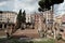 Tourists explore the ruins of the Roman Teatro Argentina