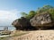 Tourists exploring Bali beach in Indonesia